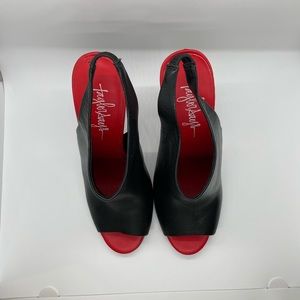 Taylor says brand black heels